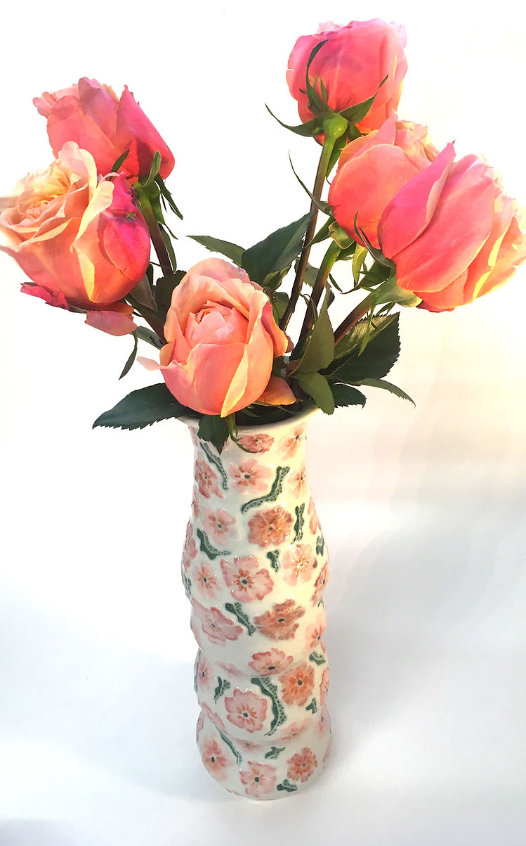 A Hand Painted Vase with Rose & Coral Floral Pattern in Relief