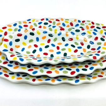 A Set of Three Handpainted Porcelain Trays