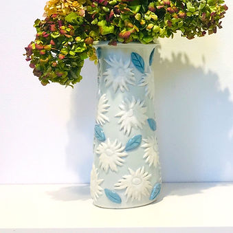 Porcelain Vase with Appliqué Flowers and Blue Leaves